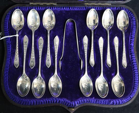 A cased set of twelve late Victorian silver teaspoons & tongs, Atkin Brother, Sheffield, 1894.